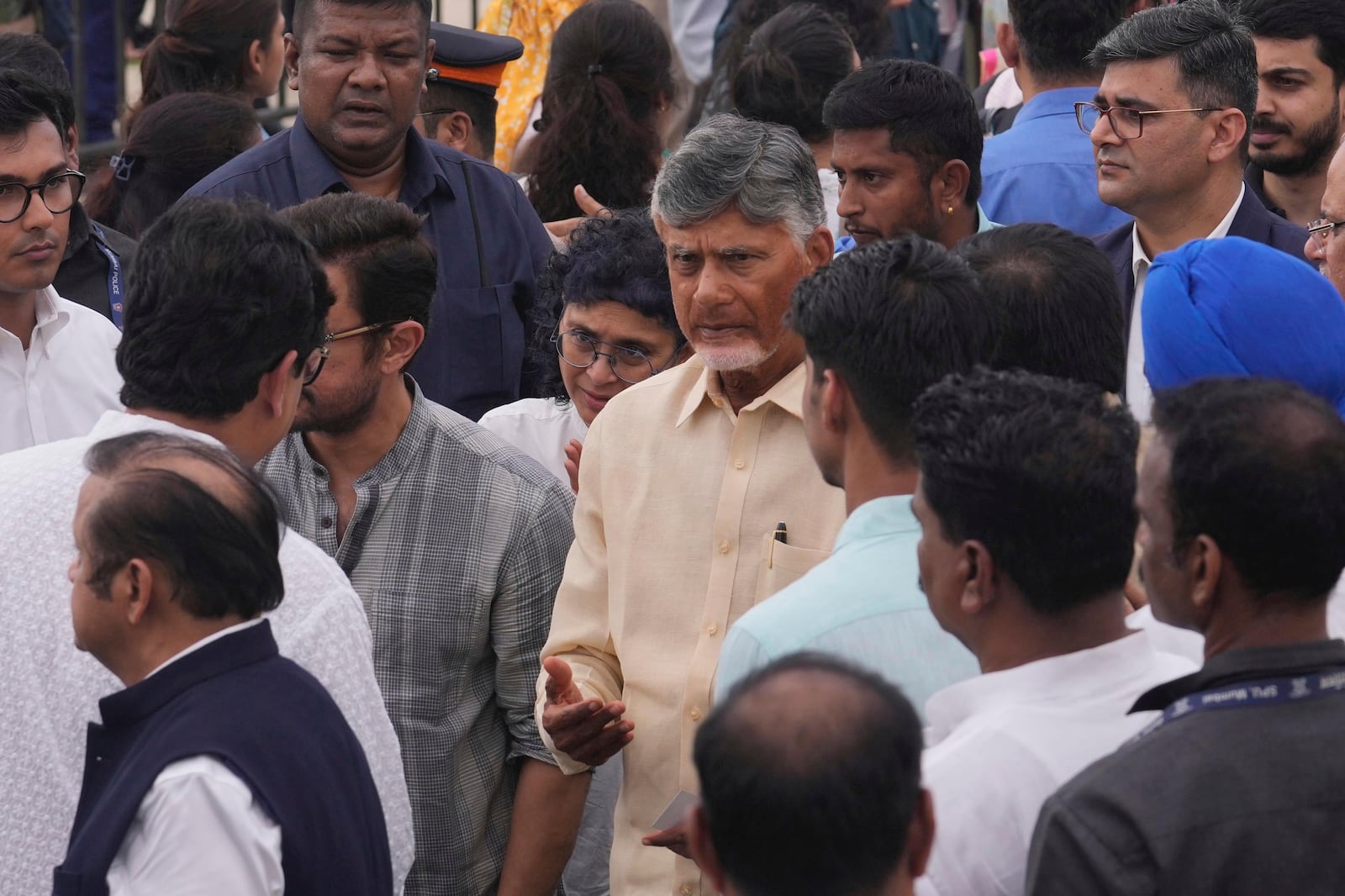 Indian state of Andhra Pradesh Chief Minister N Chandrababu Naidu,center, arrives to pay tributes to Indian business leader Ratan Tata who died on Wednesday night, in Mumbai, India, Thursday, Oct. 10, 2024. (AP Photo /Rafiq Maqbool)