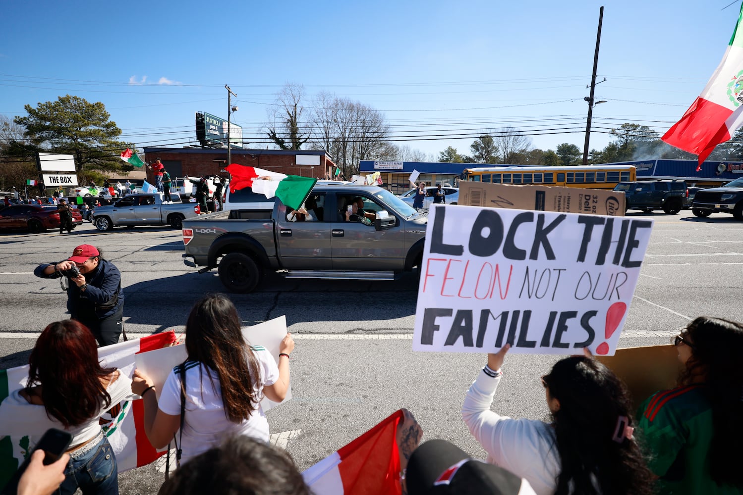 Demonstrators gathered along Buford Highway, protest outside Plaza Fiesta on Saturday, February 1, 2025, to protest a recent immigration arrest in Georgia.
(Miguel Martinez/ AJC)