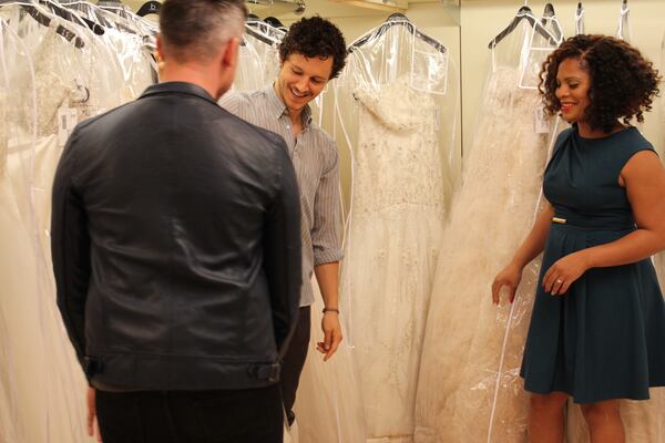 Precious ponders a dress at Bridals by Lori in Atlanta. CREDIT; TLC