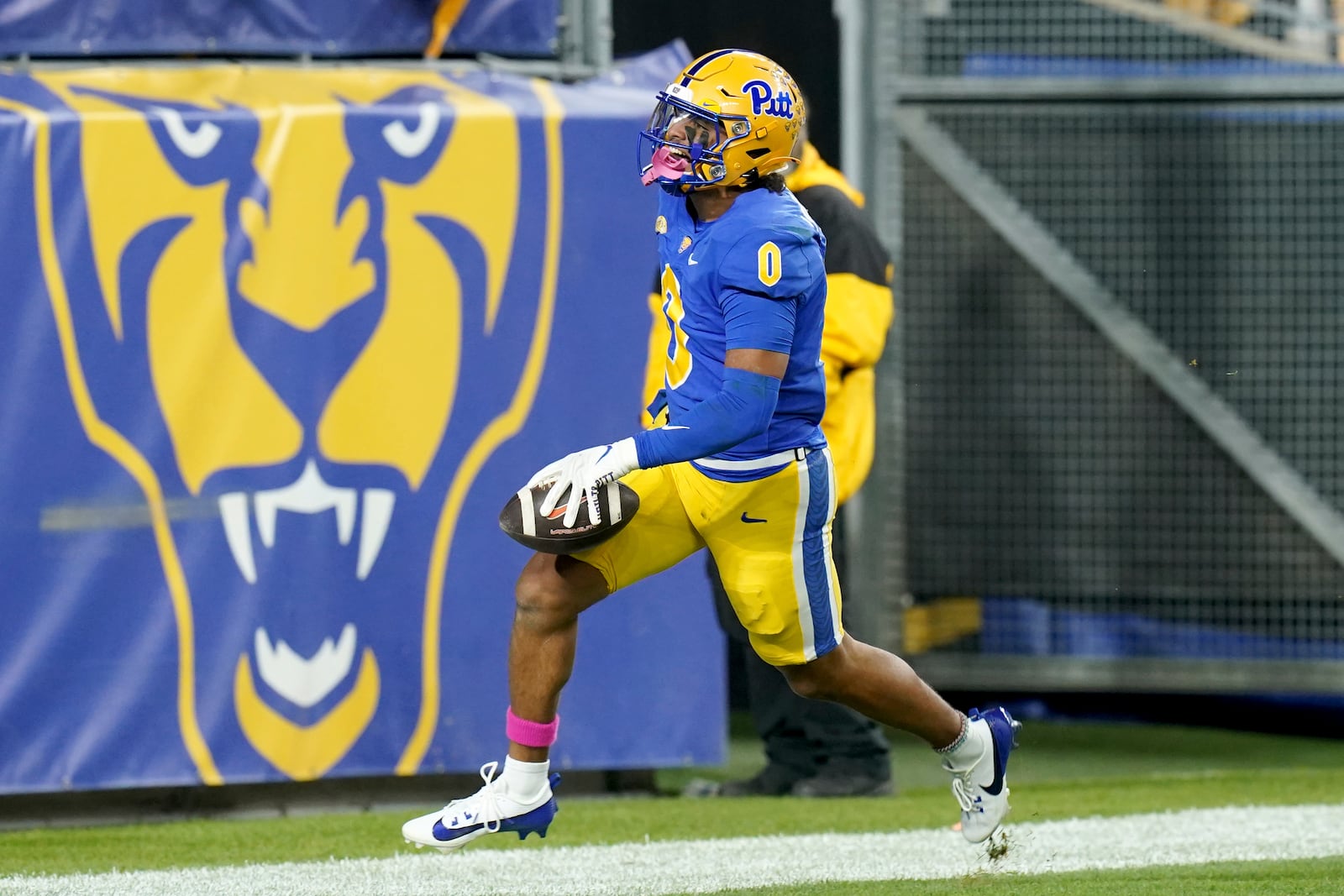 Pittsburgh linebacker Braylan Lovelace celebrates after returning an interception for a touchdown during the first half of an NCAA college football game against Syracuse, Thursday, Oct. 24, 2024, in Pittsburgh. (AP Photo/Matt Freed)