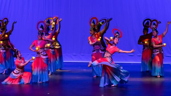 After the 1949 Chinese Revolution, scholars began to develop Chinese dance as a contemporary concert genre. This Chinese national folk dance uses the lotus flower in its traditional Buddhist context. (Photo by Patrick O’Neill)