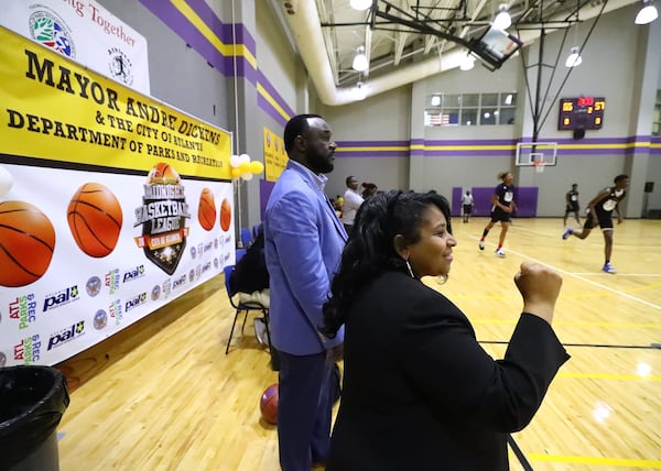 050422 Atlanta: Council Member Andrea Boone and Parks and Recreation Director Ramondo Davidson watch the competition during Atlanta Mayor Andre Dickens’ Midnight Basketball League that serves as an anti-crime initiative at the C.T. Martin Recreation Center on Wednesday, May 4, 2022, in Atlanta.    “Curtis Compton / Curtis.Compton@ajc.com”