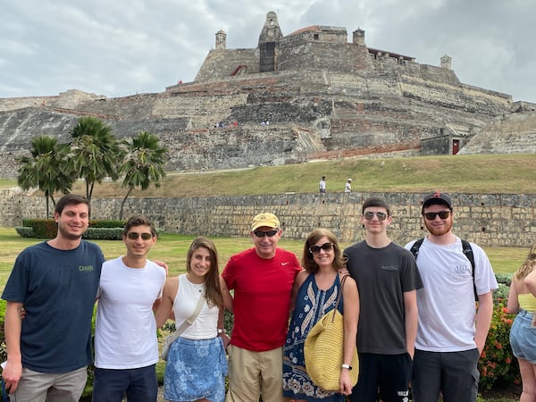 Lyric Resmondo Garten (blue dress) and her husband Jay Garten (red shirt) take their mixed-faith, blended family on a vacation every year to celebrate Christmas and Hanukkah. From left to right: Matthew, Brandon, Nicole and Jay Garten, Lyric Resmondo Garten, Spencer and Ian Resmondo.