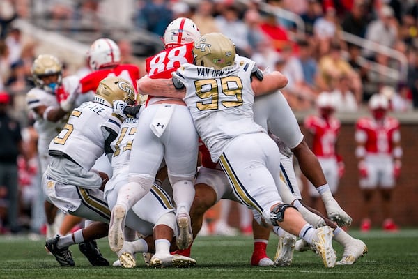 Georgia Tech defensive lineman Jordan van den Berg (99) assists his teammates in making a tackle against Virginia Military Institute on Sept. 14, 2024, at Bobby Dodd Stadium in Atlanta. (Photo by Georgia Tech Athletics/Danny Karnik)