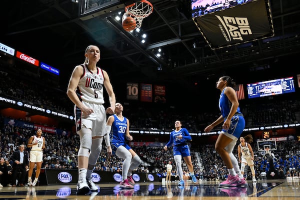 UConn guard Paige Bueckers (5) reacts after making a basket while being fouled during the second half of an NCAA college basketball game against Creighton in the finals of the Big East Conference tournament, Monday, March 10, 2025, in Uncasville, Conn. (AP Photo/Jessica Hill)