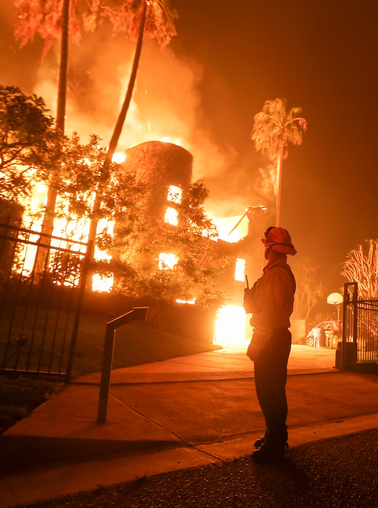 Photos: Deadly wildfires blaze through northern, southern California