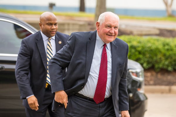 04/05/2019 -- Newnan, Georgia -- United States Secretary of Agriculture Sonny Perdue (center) arrives at the U.S. Department of Agriculture's National Detector Dog Training Facility in Newnan, Friday, April 5, 2019.  (ALYSSA POINTER/ALYSSA.POINTER@AJC.COM)