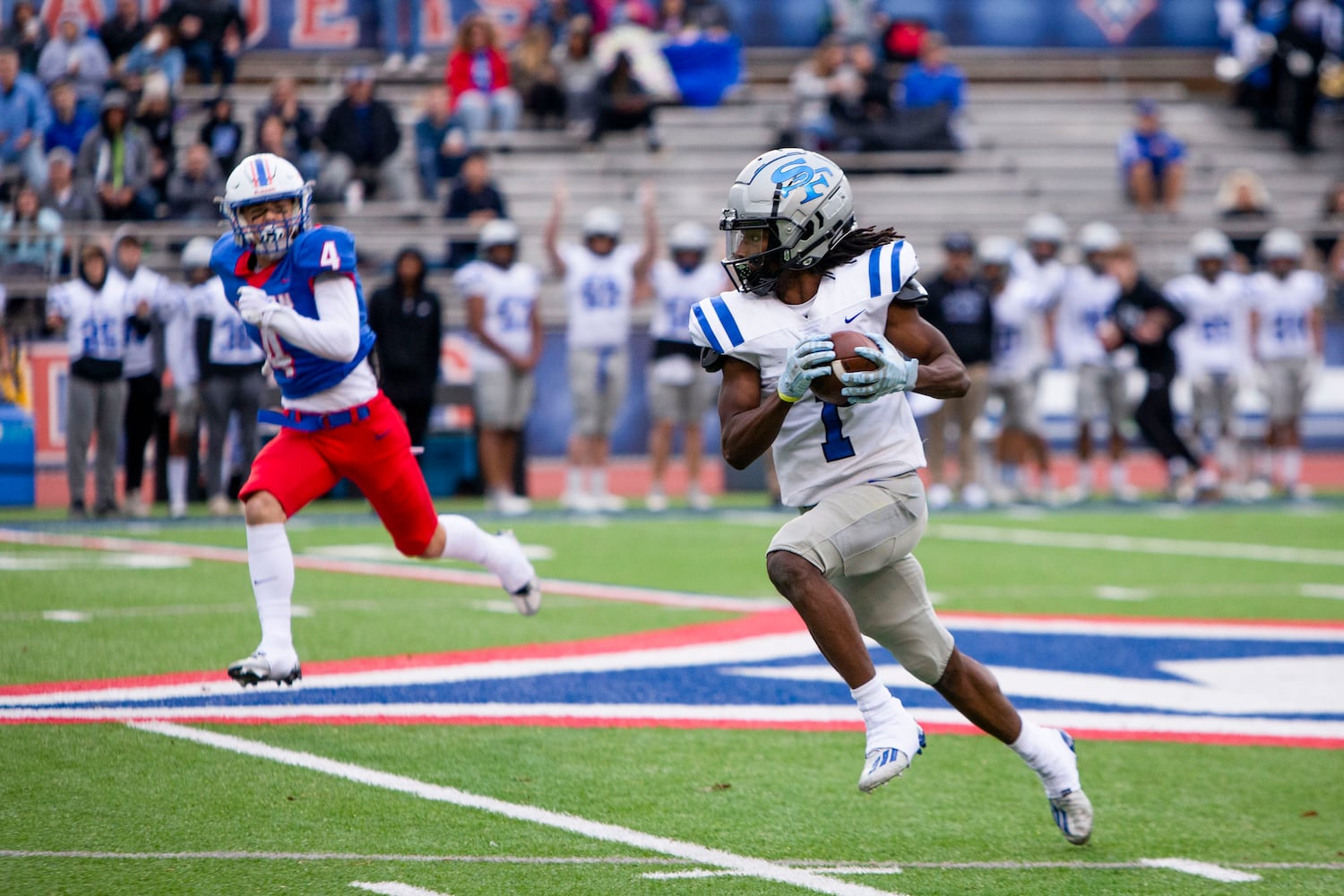 Chris Nelson,  quarterback for South Forsyth, runs the ball. CHRISTINA MATACOTTA FOR THE ATLANTA JOURNAL-CONSTITUTION.