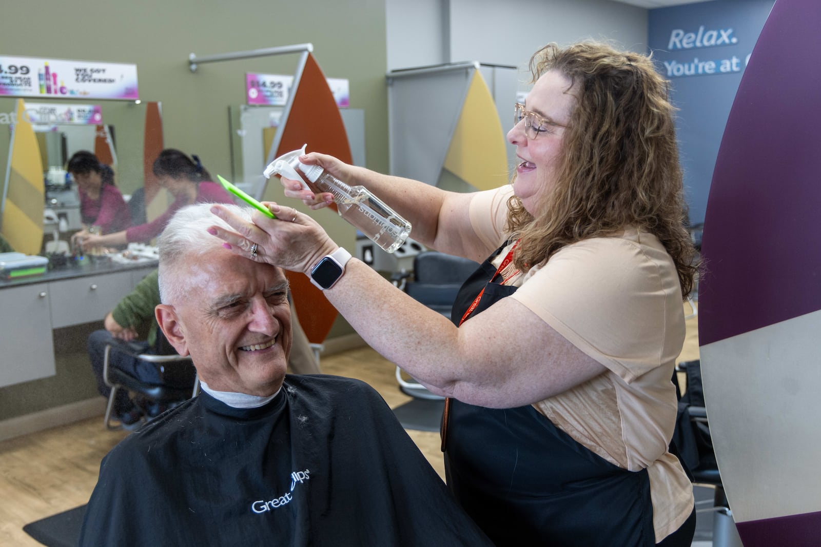 Salon Manager Susan Perdue (right) rose through the ranks at Great Clips.  PHIL SKINNER FOR THE ATLANTA JOURNAL-CONSTITUTION