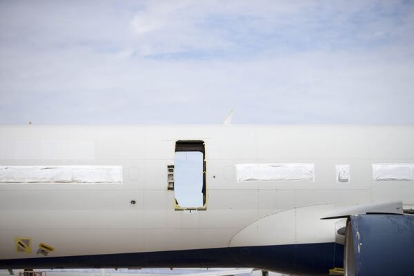 01/03/2018 — Marana, AZ, - A deconstructed Delta airplane sits inside PinalAirpark in Marana, Arizona, Wednesday, January 3, 2018. At PinalAirpark, airlines are able to salvage parts from their used aircrafts and offer up the unwanted pieces for recycling. ALYSSA POINTER/ALYSSA.POINTER@AJC.COM