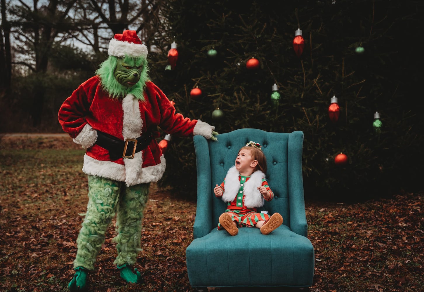 Photos: The Grinch surprises, scares children during photo shoot