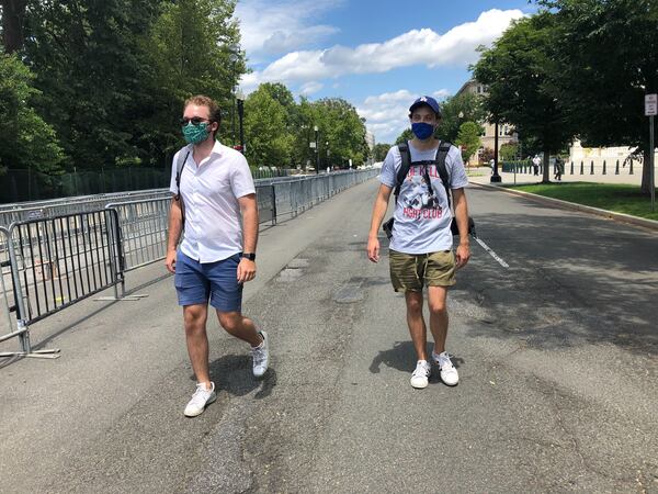 Nadir Tekarli (left) and Dallin Johnson of Washington came by the U.S. Capitol Tues., July 28, 2020, to pay final respects to Rep. John Lewis.