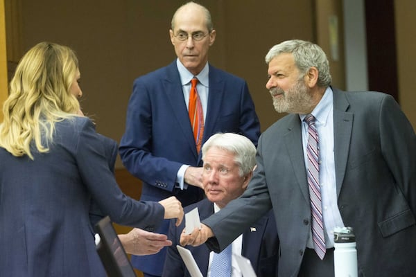 Claud “Tex” McIver watches as his defense attorneys pass around questions posed by the jury during Day 19 of his trial before Fulton County Superior Court Chief Judge Robert McBurney on Friday, April 13, 2018. (ALYSSA POINTER/ALYSSA.POINTER@AJC.COM)