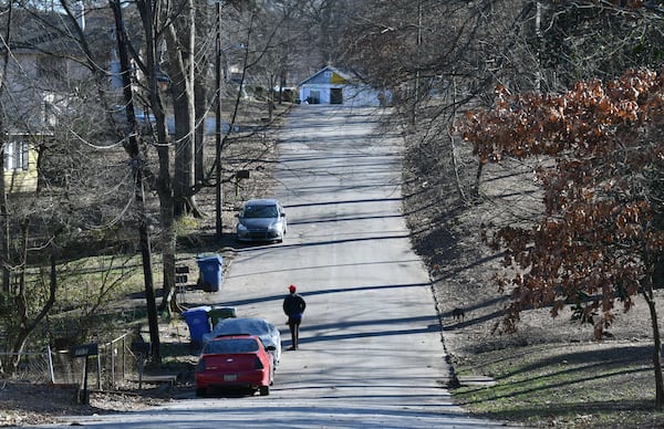 One of Grove Park's tree-lined neighborhood streets. (Hyosub Shin / Hyosub.Shin@ajc.com)