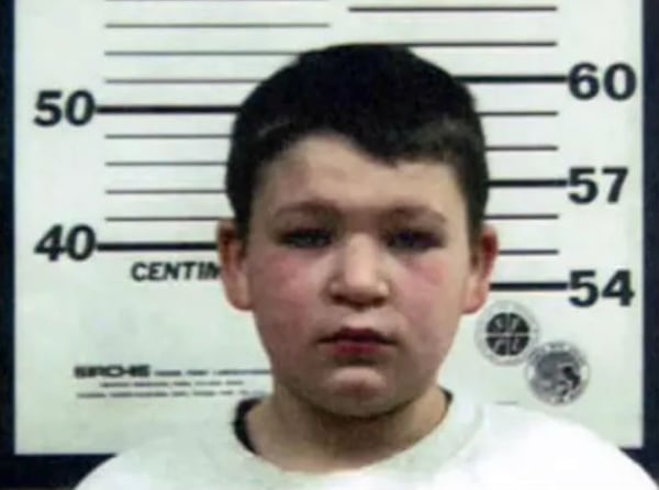 Jordan Brown, 11, is pictured following his arrest in the Feb. 20, 2009, shotgun slaying of his father's pregnant fiancee, Kenzie Marie Houk. The boy, who was initially charged as an adult, spent several years in juvenile detention before being released in 2016. The Pennsylvania Supreme Court on July 18, 2018, exonerated Brown, now 20, of the crime, citing a lack of evidence pointing to his involvement.