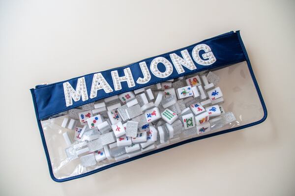 Brands like Oh My Mahjong design stylish mahjong accessories such as this pouch for tiles.
(Courtesy of Swoozie's)