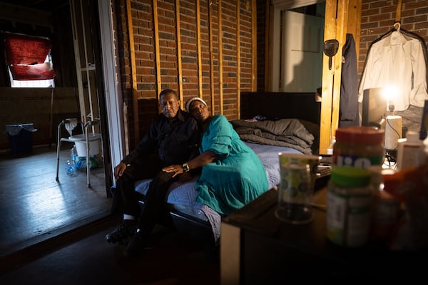 Dorothy and George Williams, who fell victim to a home repair scam, pose for a portrait in their home in Atlanta on Monday, May 13, 2024. (Arvin Temkar / AJC)