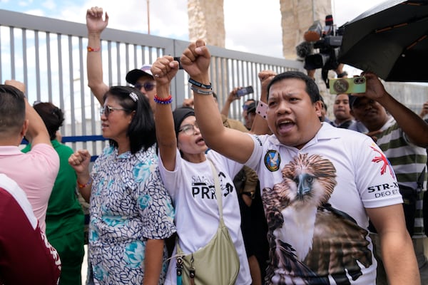 Supporters rally outside Villamor Air Base after former President Rodrigo Duterte was arrested, Tuesday, March 11, 2025, near Manila, Philippines. (AP Photo/Aaron Favila)