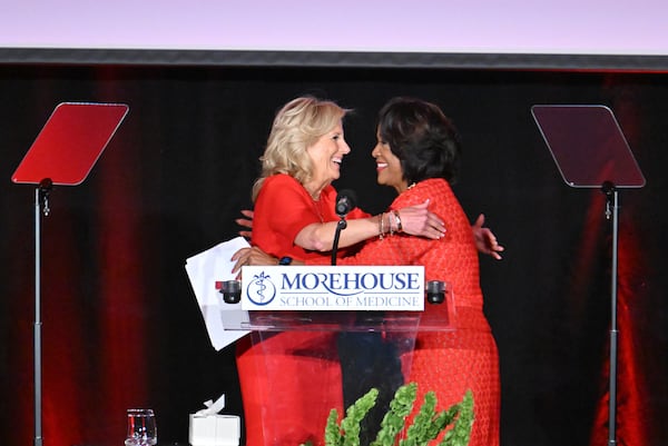 First Lady Jill Biden is greeted by Dr. Valerie Montgomery Rice, President of Morehouse School of Medicine, during Morehouse School of Medicine’s 2024 Women’s Heart Healthy Luncheon at the Georgia Aquarium, Wednesday, February 7, 2024, in Atlanta. (Hyosub Shin / Hyosub.Shin@ajc.com)