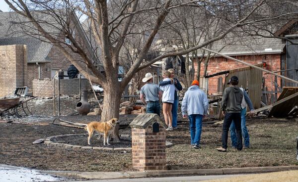 Stillwater, Okla., residents show support to some of the victims of lost homes on Saturday, March 15, 2025, due to Friday's wildfires in the Crosswinds and Pecan Hill communities on the west side of town. (Jason Elmquist/The News Press via AP)