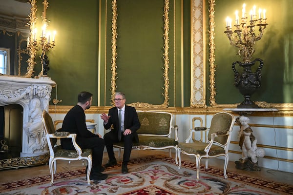 Britain's Prime Minister Keir Starmer, right, and Ukraine's President Volodymyr Zelenskyy meet during the European leaders' summit to discuss Ukraine, hosted by Britain's Prime Minister Keir Starmer, at Lancaster House, London, Sunday March 2, 2025. (Justin Tallis/Pool via AP)