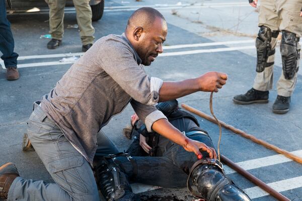  Lennie James as Morgan Jones, Logan Miller as Benjamin - The Walking Dead _ Season 7, Episode 13 - Photo Credit: Gene Page/AMC