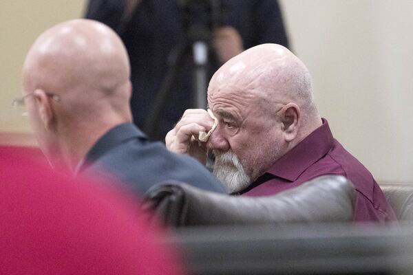 06/22/2018 — Griffin, GA - Franklin Gebhardt (right) becomes emotional while listening to an audio recording of an interview he had with investigators about the 1983 murder of Timothy Coggins. ALYSSA POINTER/ALYSSA.POINTER@AJC.COM