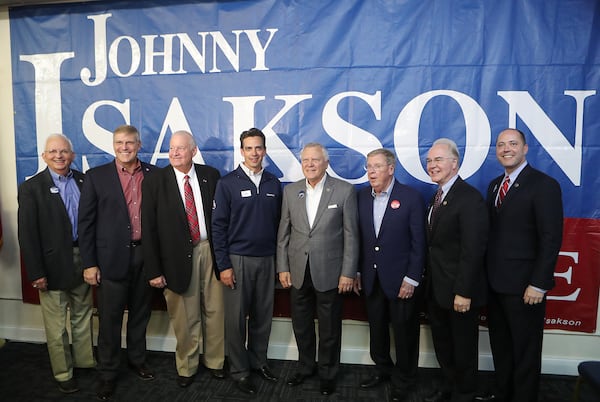 Republican officials gather for a photo with U.S. Sen. Johnny Isakson during a rally in 2016. Curtis Compton /ccompton@ajc.com