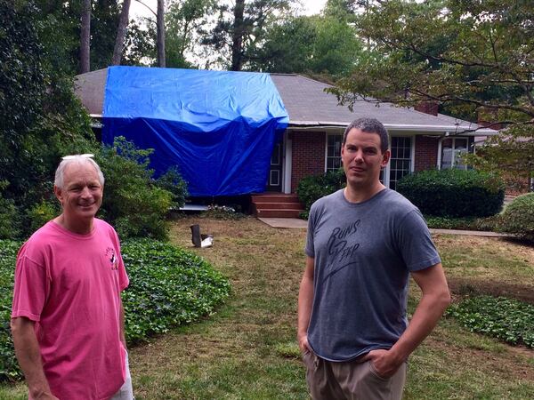 Stephen Perras and Zac Raby, part of the Medlock Park neighborhood’s Chainsaw Gang, were busy fellows all week after storms rolled in Monday afternoon.