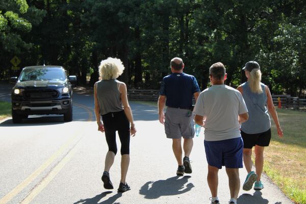 (L to R) Waunelle Jackson-Ian, Brad McCahill and Lou and LuAnn DelVerme walk nearly every day at Kennesaw Mountain and said they support closing the road to cars and limiting bike access due to safety concerns on Monday, July 1, 2024. (Taylor Croft/taylor.croft@ajc.com)