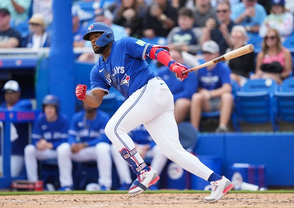 Toronto Blue Jays' Vladimir Guerrero Jr. (27) grounds out against the New York Yankees during the third inning of a spring training baseball game in Dunedin Fla., Saturday, Feb. 22, 2025. (Nathan Denette/The Canadian Press via AP)