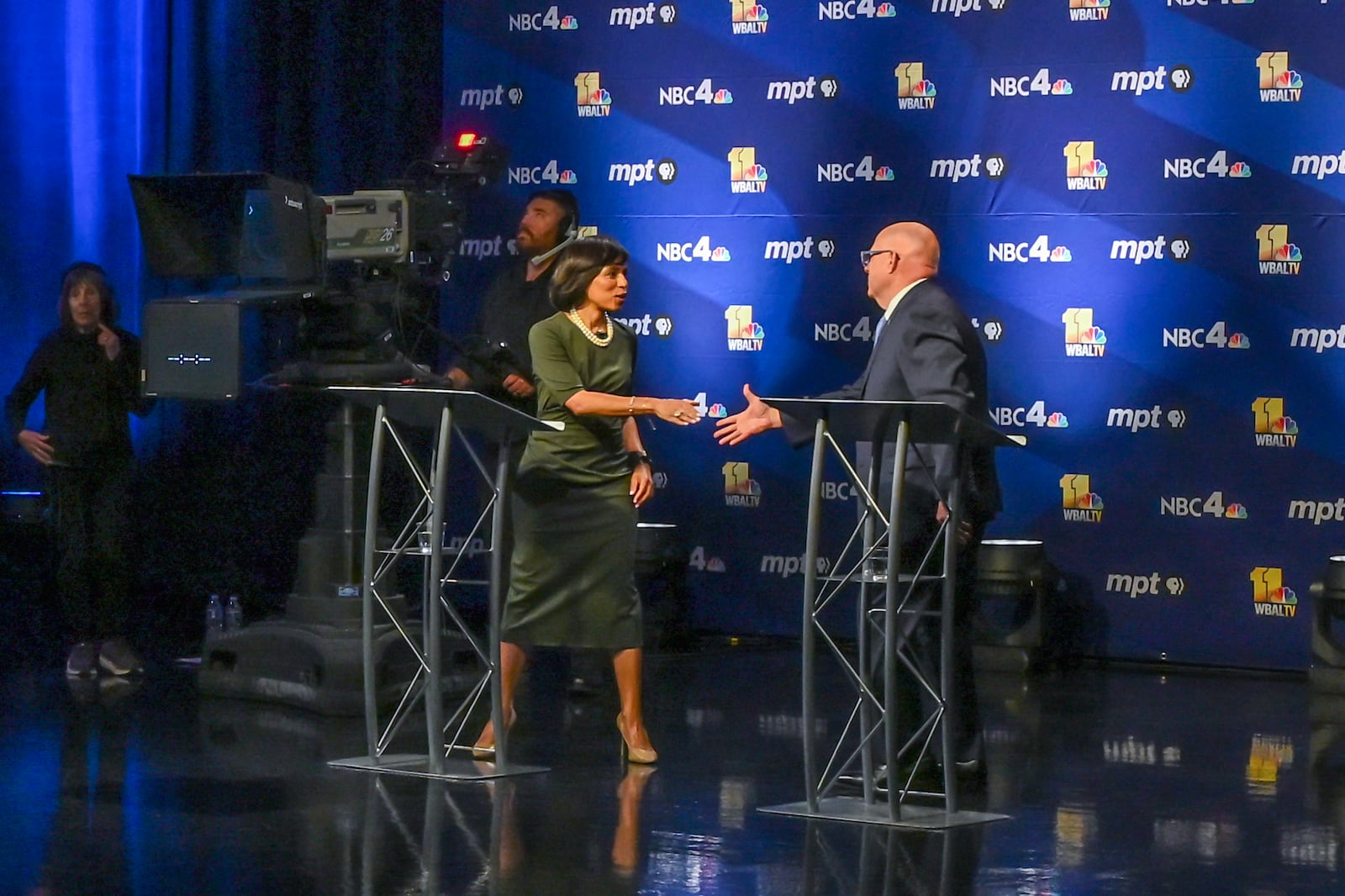 In this photo provided by Maryland Public Television, U.S. Senate in Maryland candidate, Democrat Angela Alsobrooks shakes hands with fellow-candidate, Republican Larry Hogan after during a debate at Maryland Public Television in Owings Mills, Md., Thursday, Oct. 10, 2024. (Michael Ciesielski Photography/Maryland Public Television via AP)