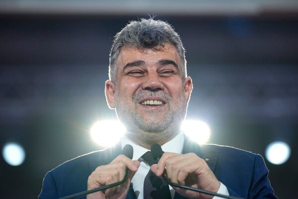 Romanian Prime Minister Marcel Ciolacu addresses delegates at the congress of the Social Democratic Party or PSD, which nominated him as the party's candidate in the upcoming Nov. 24 presidential elections in Bucharest, Romania, Saturday, Aug. 24, 2024. (AP Photo/Andreea Alexandru)