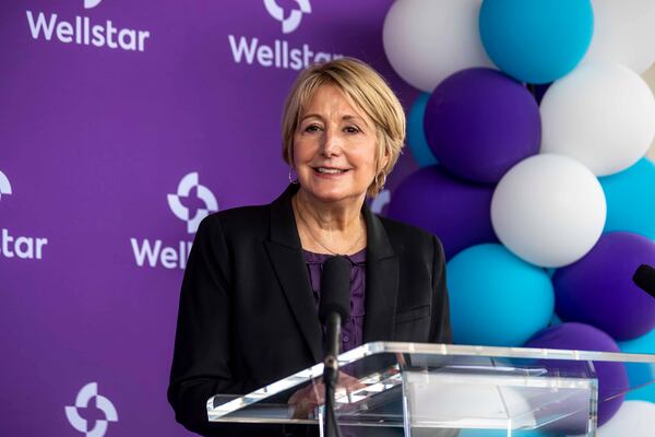 Candice Saunders, president and CEO of Wellstar Health System, says the Augusta University Health System partnership will have benefits for patients and physicians. She is shown at a ribbon-cutting ceremony for the new Wellstar Kennestone Hospital Emergency Department building in Marietta in July 2020. (Alyssa Pointer / AJC file photo)