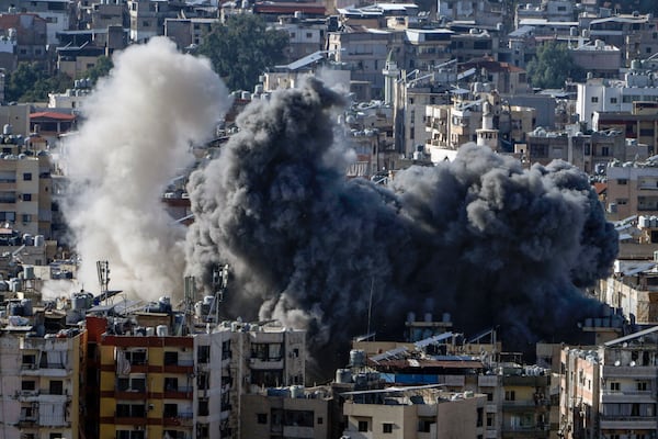 Smoke rises after an Israeli airstrike on Dahiyeh, in the southern suburb of Beirut, Lebanon, Saturday, Nov. 16, 2024. (AP Photo/Bilal Hussein)