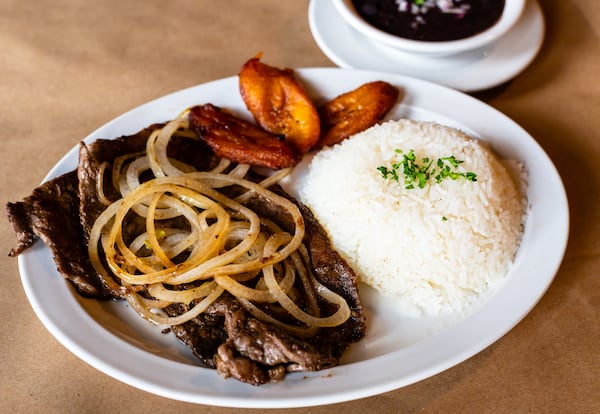 The Palomilla, thin-sliced steak with onions, at Lazaro's Cuban Cuisine will satisfy your steak craving without torturing your wallet. CONTRIBUTED BY HENRI HOLLIS