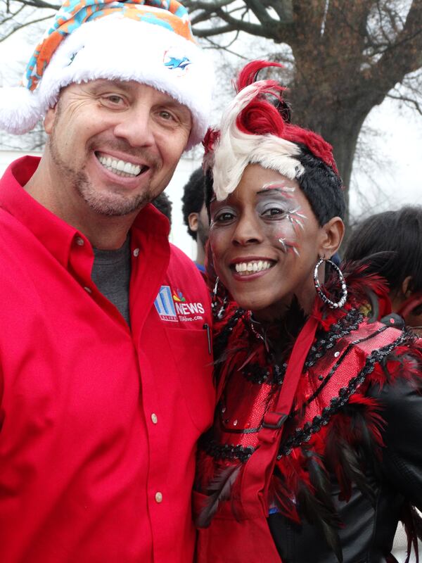 Crash Clark with the "original Bird Lady" Keisha Burns. CREDIT: Rodney Ho/rho@ajc.com