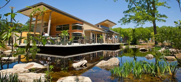 The Atlanta Botanical Garden’s Gainesville location features a visitor center, shown here, a model train garden and an amphitheater. It also includes a conservation nursery where endangered plants are propagated. CONTRIBUTED BY ATLANTA BOTANICAL GARDEN