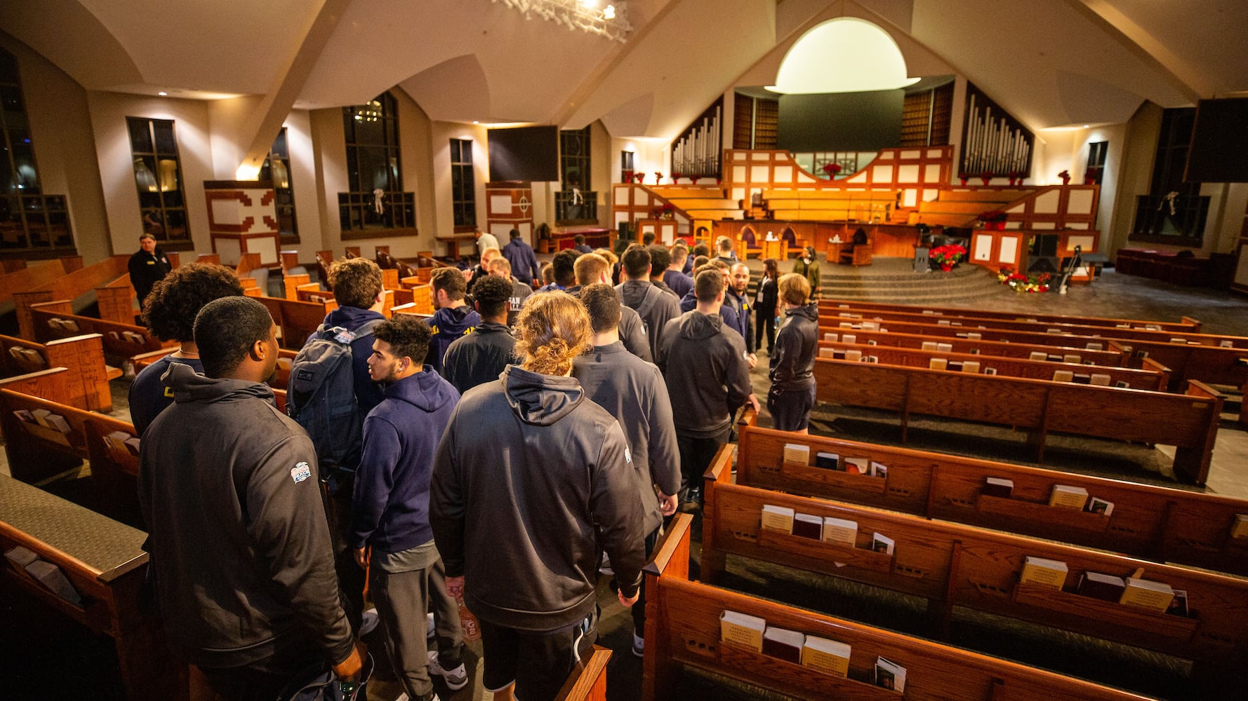 Michigan-Florida players visit Ebenezer Baptist Church