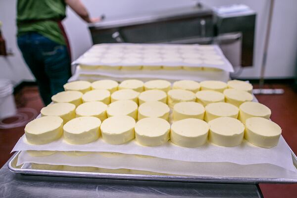 The finished butter - cut, formed and stacked for wrapping. (Photo credit: Erik Meadows Photography)