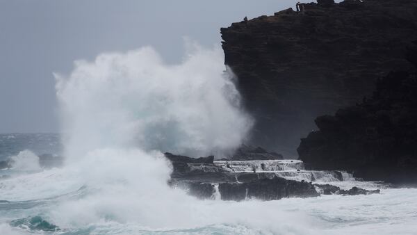 Huge waves slam the cliffs near the Halona Blowhole in Waimanalo, Hawaii. As Hurricane Lane approaches Oahu, large oceans swells have impacted the coastline.