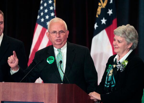 Georgia Agriculture Commissioner Gary Black, shown with his wife, Lydia, is running an ad for his U.S. Senate campaign that attacks Herschel Walker, a fellow Republican in the race, for supporting a path to citizenship for immigrants in the country illegally. “Herschel Walker sides with (President Joe) Biden and (Democratic U.S. Sen. Raphael) Warnock — Herschel supports amnesty — and citizenship for illegals,” Black says in the ad.