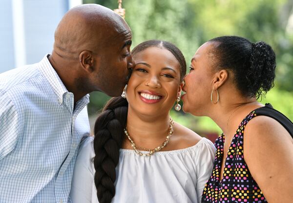 The hours that Steven Johnson and Arlethia Perry-Johnson didn't know the fate of their only child, La'Nita Johnson, after a 2016 terrorist attack in Burkina Faso in West Africa tested their faith. Here, they're together at the parents' home in Powder Springs on Friday, July 2, 2021. (Hyosub Shin / Hyosub.Shin@ajc.com)