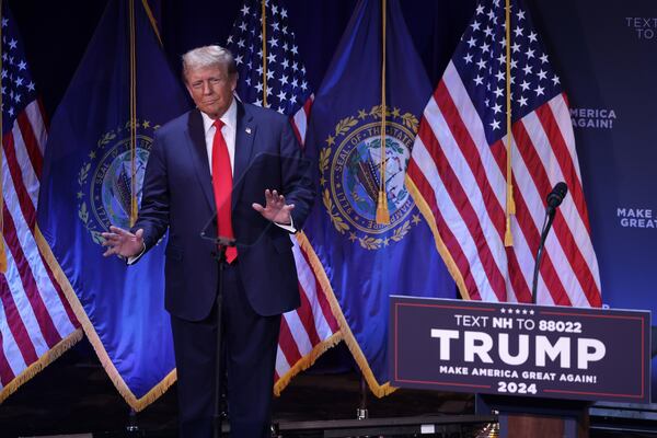 Former President Donald Trump, now running for the GOP presidential nomination, often devotes parts of his campaign speeches to berating Fulton County District Attorney Fani Willis and other prosecutors who have brought 91 criminal charges against him. At a rally Sunday in Rochester, New Hampshire, he said he would direct an “overhaul of the Department of Justice to investigate every radical, out-of-control prosecutor in America for their illegal, racist and reverse enforcement of the law.” (Alex Wong/Getty Images/TNS)