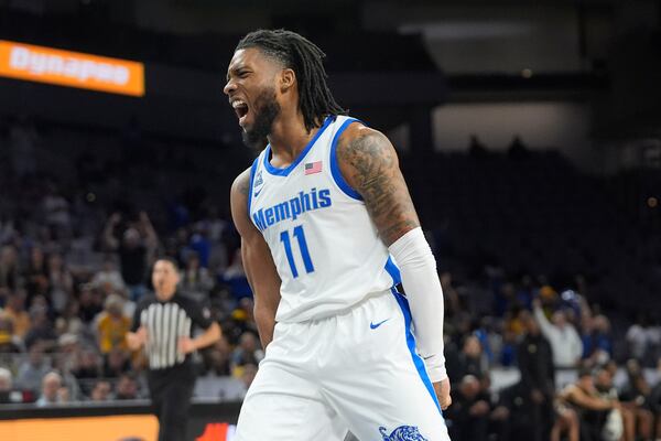 Memphis guard Tyrese Hunter reacts after a play during the second half against Wichita State in the quarter final of the American Athletic Conference tournament in Fort Worth, Texas, Friday, March 14, 2025. (AP Photo/LM Otero)