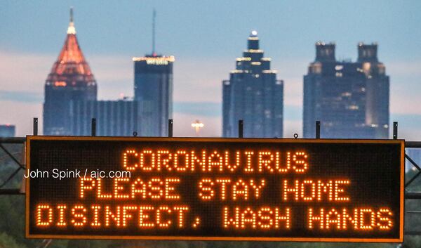 NB I-85 Bear Central Ave in Hapeville - GDOT Boards lighting up COVID messages Monday morning