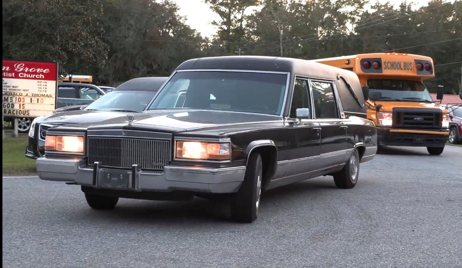 A hearse heads to Meridian Dock in McIntosh county where several people after a gangway collapsed plunging them into the water, on Sapelo Island, Ga in McIntosh County on Sunday, Oct. 20, 2024. (AP Photo/Lewis M. Levine)