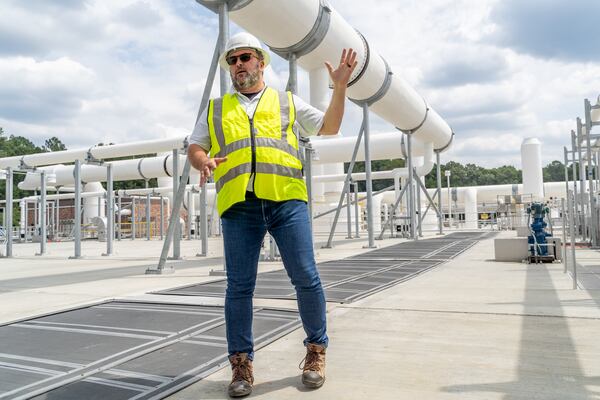 Fulton County Director of Public Works David Clark explaines the aeration process. Fulton County officials tour the new water reclamation facility built on the grouds of the existing Big Creek Wastewater Treament center. Thursday, August 22, 2024 (Ben Hendren for the Atlanta Journal-Constitution)