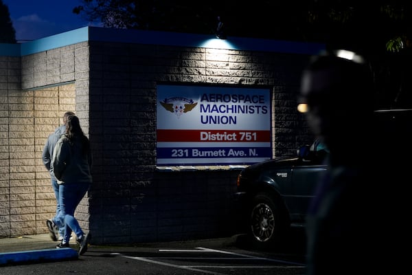 Boeing employees arrive to vote on a new contract offer from the company Monday, Nov. 4, 2024, at the Aerospace Machinists Union hall in Renton, Wash. (AP Photo/Lindsey Wasson)