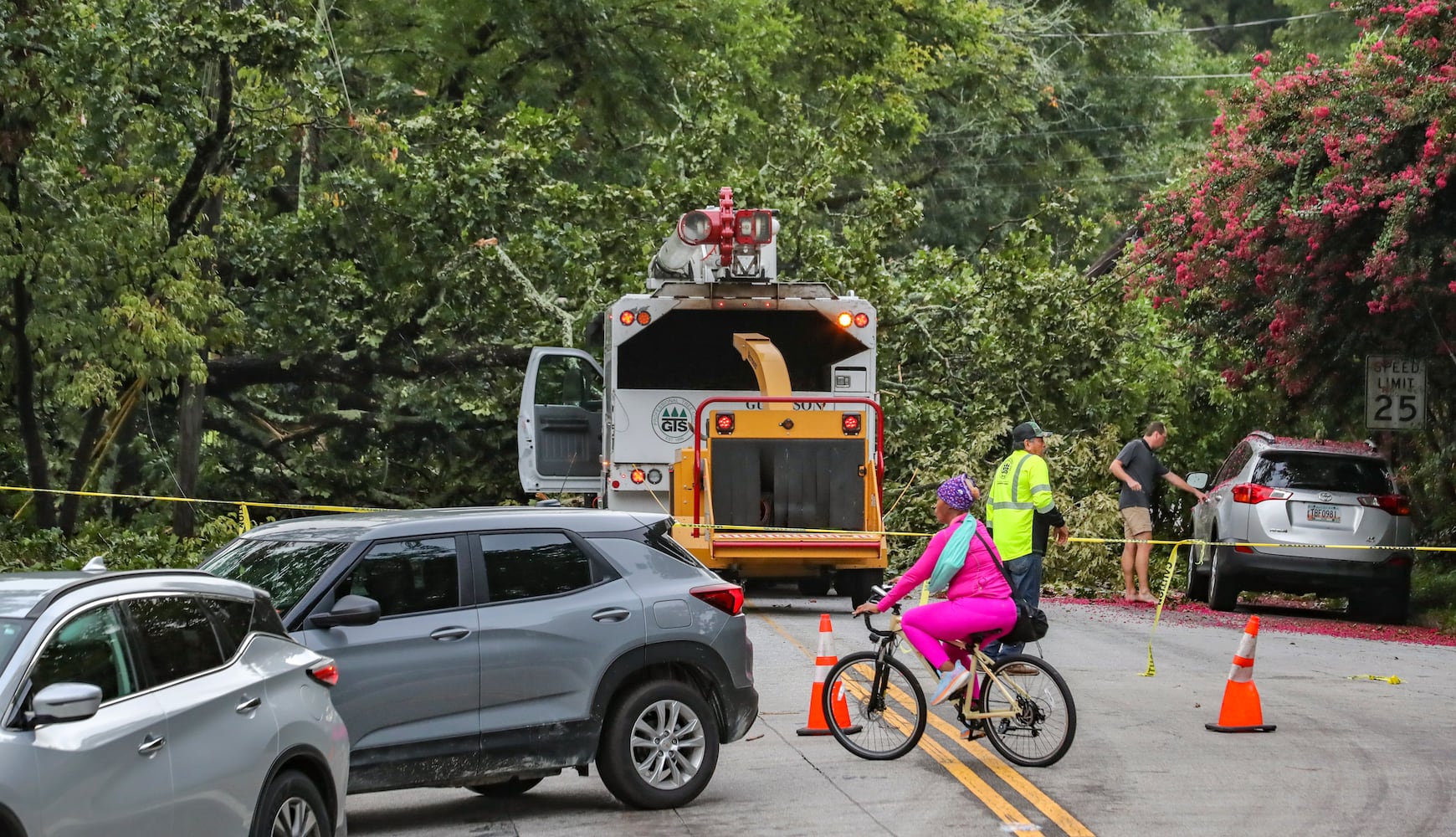 August 30, 2023 Atlanta: A large tree fell from a nearby house that blocked morning traffic on East Morningside Drive near Piedmont Avenue in Midtown Atlanta on Wednesday, Aug. 30, 2023 as overnight rain left a soggy metro.Gov. Brian Kemp on Tuesday, Aug. 30, 2023 declared a state of emergency with Hurricane Idalia expected to bring life-threatening storm surges to Florida’s Gulf Coast Wednesday before heading into southwest Georgia. High winds, heavy rain, flash flooding and widespread power outages are possible in Florida and in south and coastal Georgia, according to the National Hurricane Center. Tornadoes are also possible in Georgia, the National Weather Service said. The storm’s rain bands could reach metro Atlanta. “We are taking every precaution ahead of Hurricane Idalia’s landfall (Wednesday), and I am taking this additional executive action to ensure state assets are ready to respond,” Kemp said. Georgia farmers, who have millions of dollars worth of peanuts, pecans and cotton sitting in their fields, were making final preparations on Tuesday. “Most people would probably like to see some rain this time of year to sort of finish out the crop; that part of it would be a blessing,” said Jonathan Mann, co-owner of GBJ Mann Farms in Surrency, about 90 miles southwest of Savannah. “But it’s the wind that would have me very concerned.” (John Spink / John.Spink@ajc.com)

